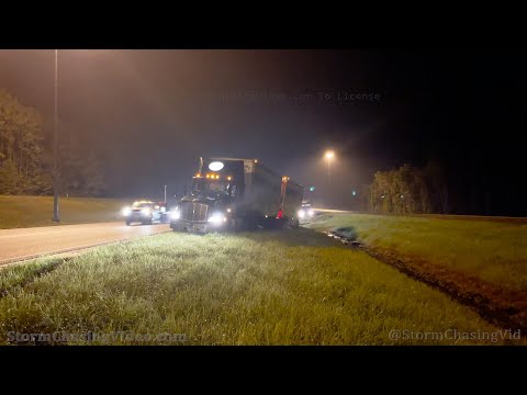 Tropical Storm Mindy blows Semi Trucks And Bus of the road near Tallahassee, FL
