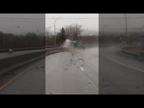 Truck Crashes into Median on Wet Roads! Near Miss!