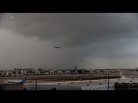 Dark Sky & Heavy Rain Over Miami International Airport & Port Of Miami